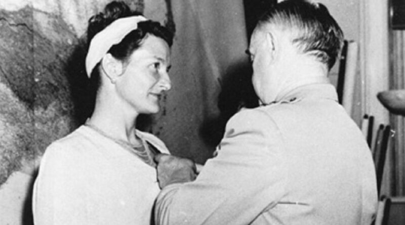 Virginia Hall receiving a Distinguished Service Cross from President Harry Truman